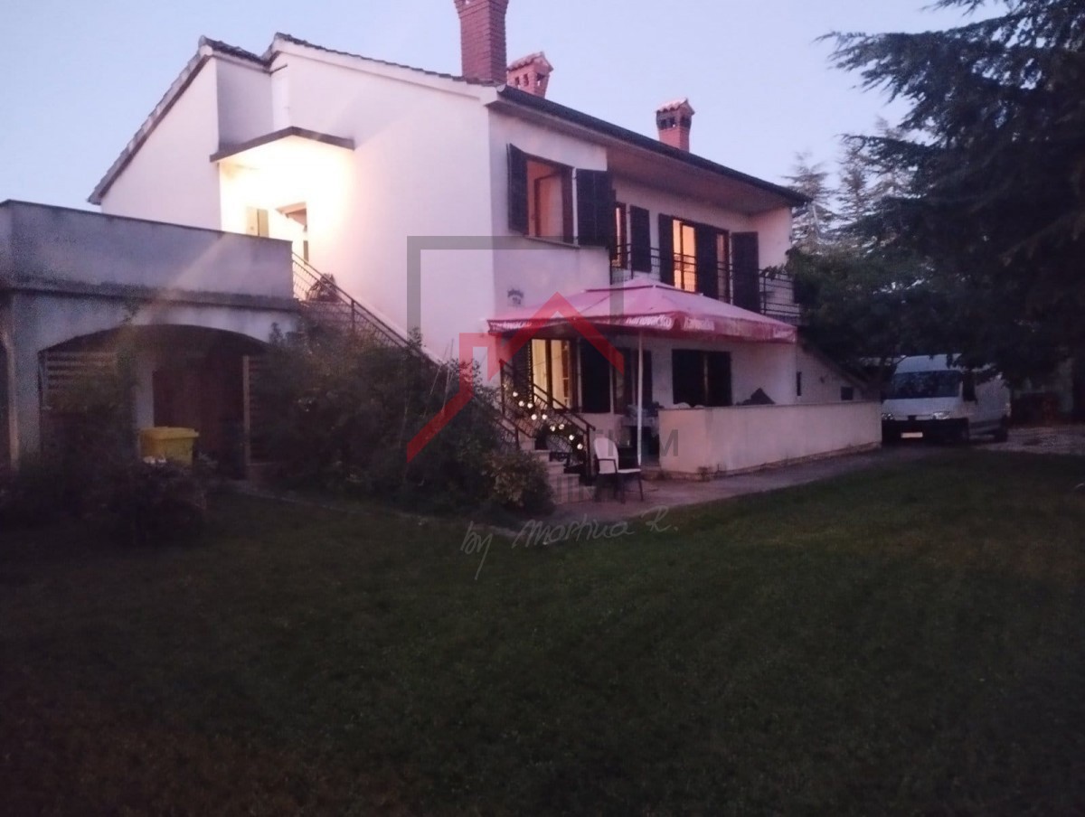 Casa indipendente con ampio giardino e terreno edificabile