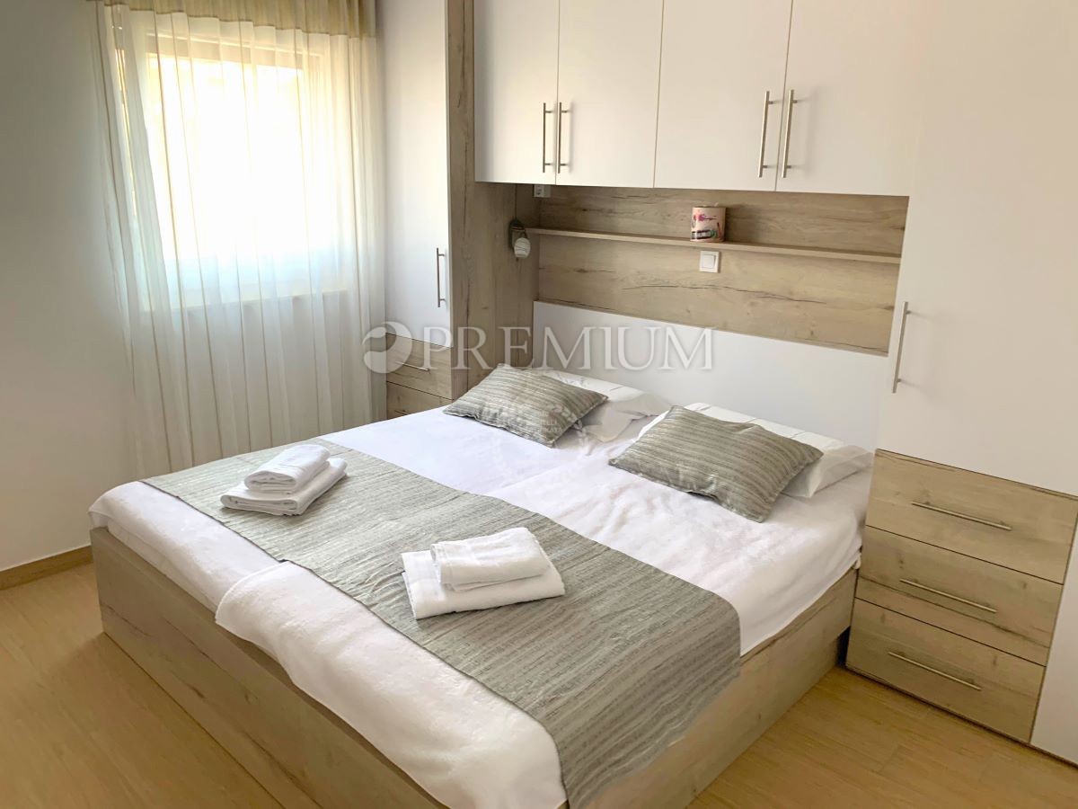 Malinska – appartamento con due unità e giardino, al mare!