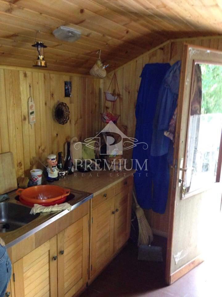 CASA DI CACCIA IN LEGNO CON TERRENO 8.971 m2, OCCASIONE!