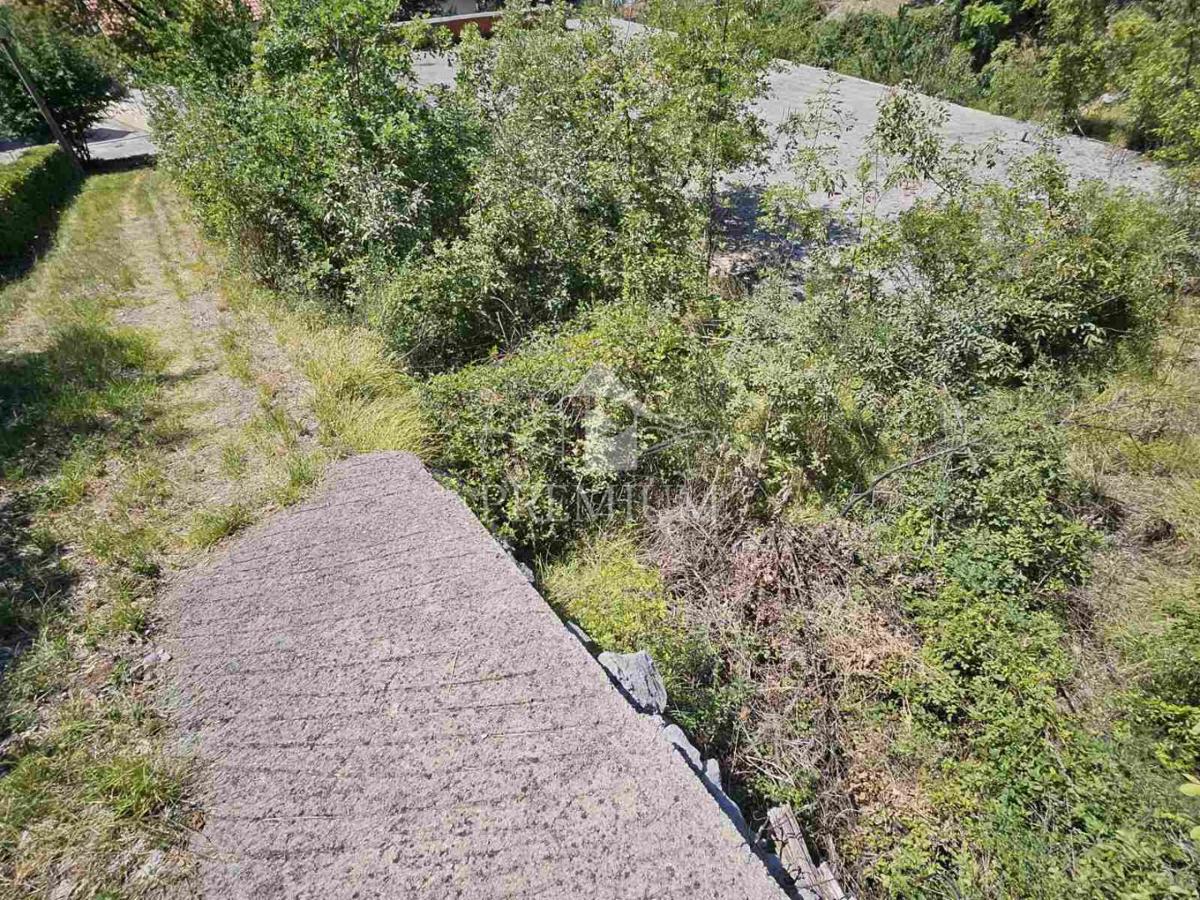 TERRENO CON COSTRUZIONE INIZIATA