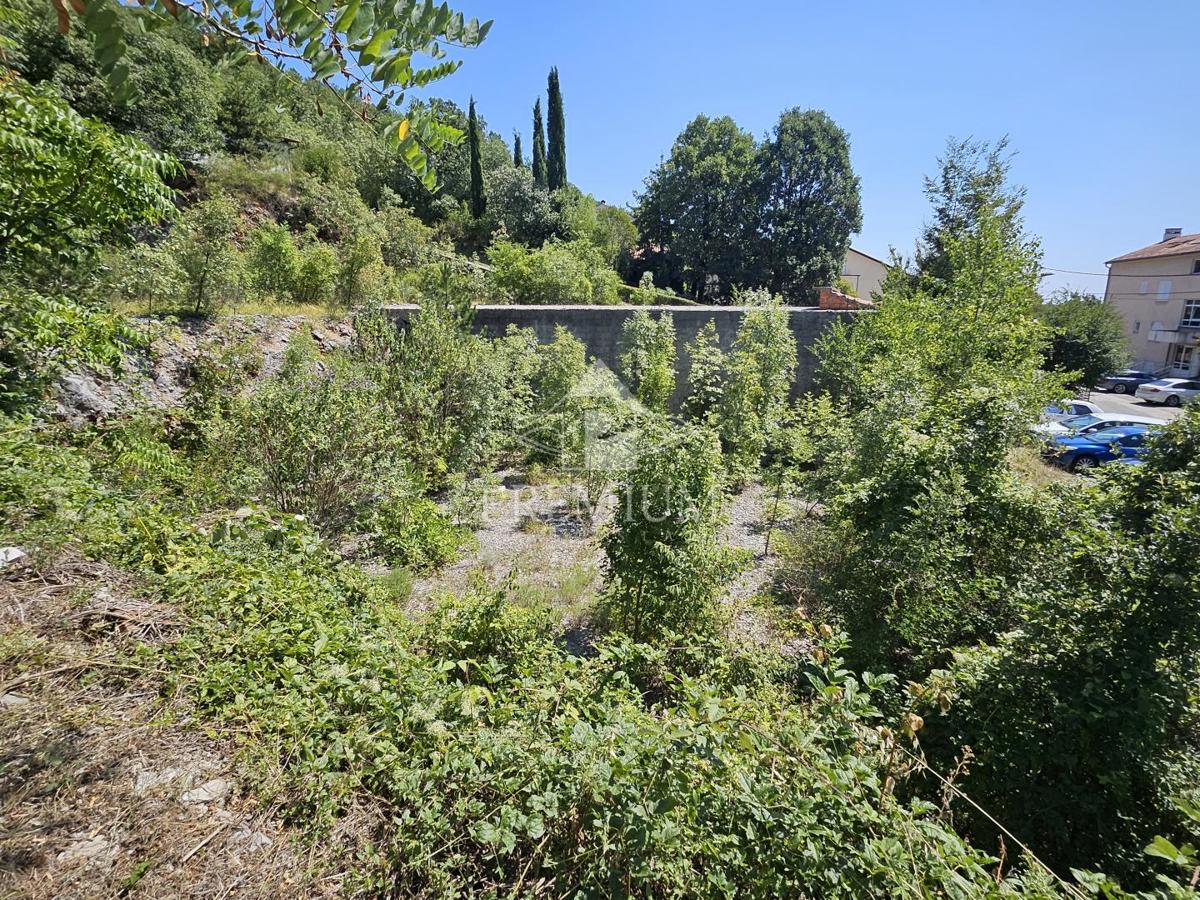 TERRENO CON COSTRUZIONE INIZIATA