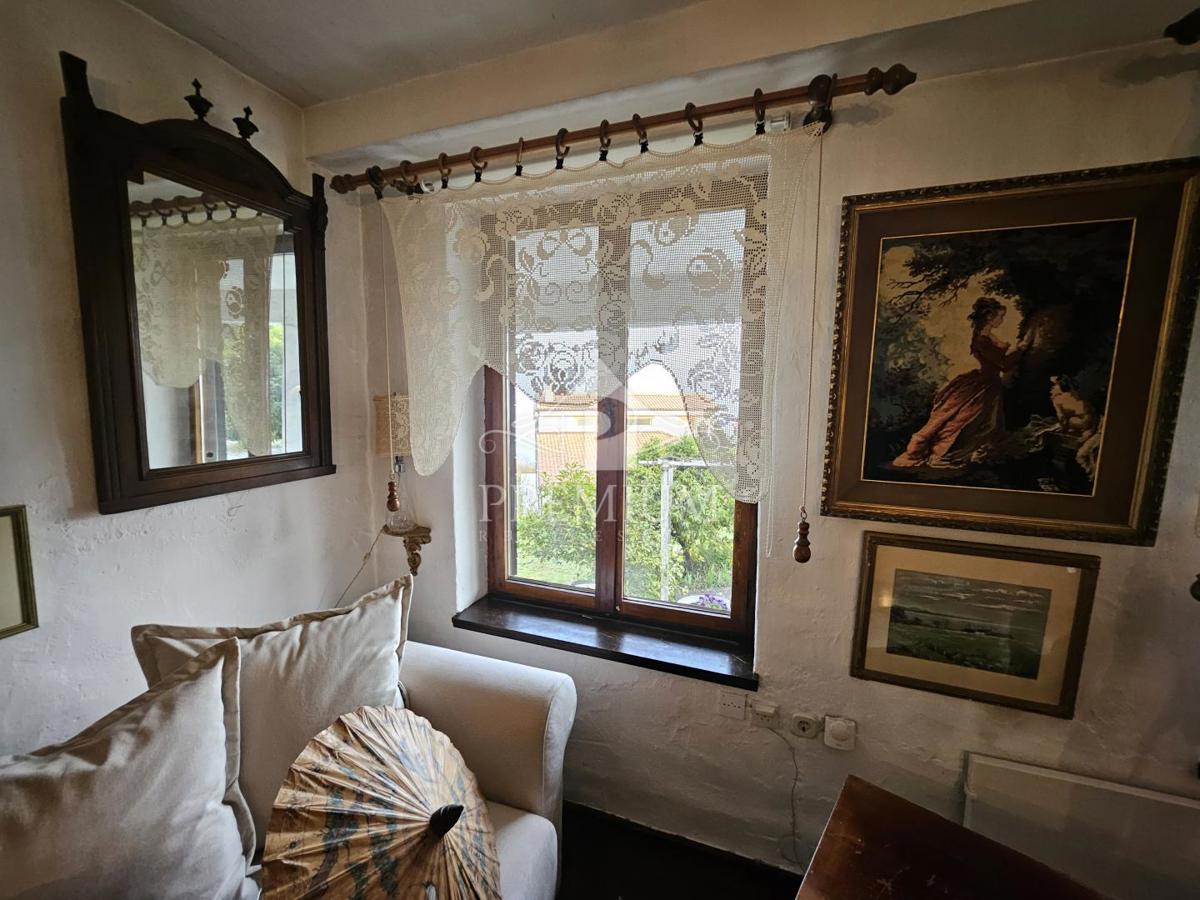 CASA UNIFAMILIARE CON AMPIO GIARDINO IN POSIZIONE TRANQUILLA