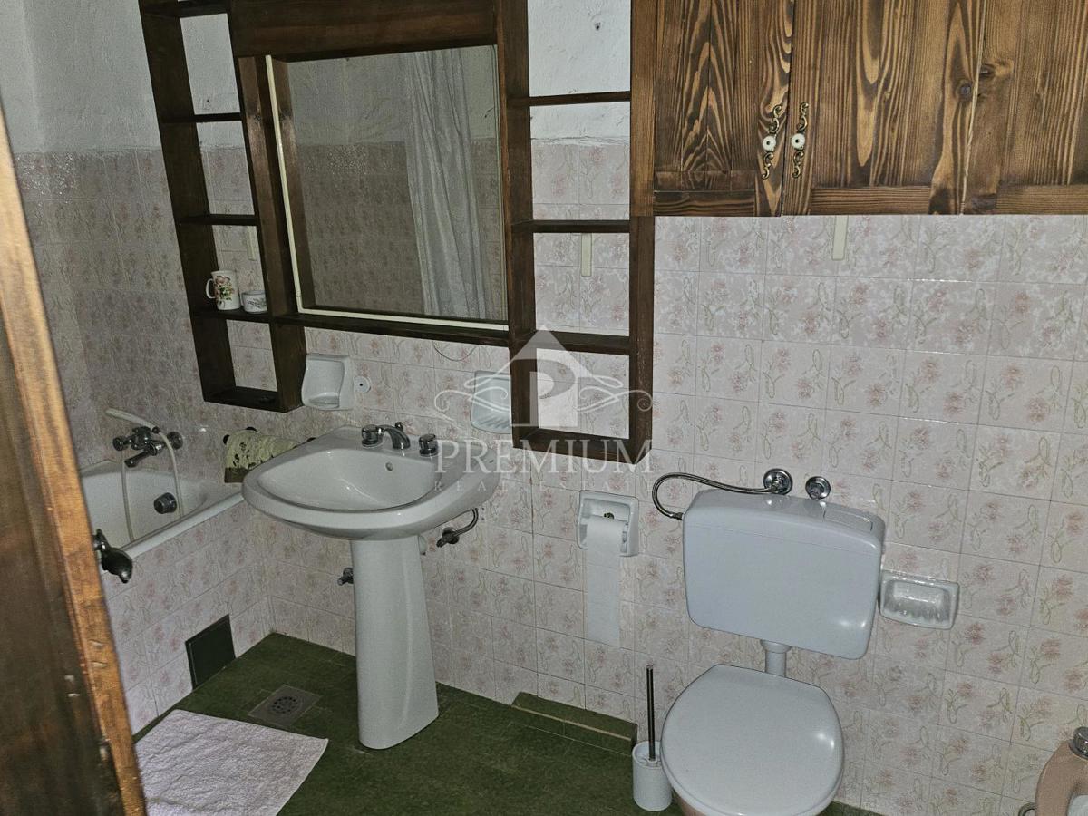 CASA UNIFAMILIARE CON AMPIO GIARDINO IN POSIZIONE TRANQUILLA