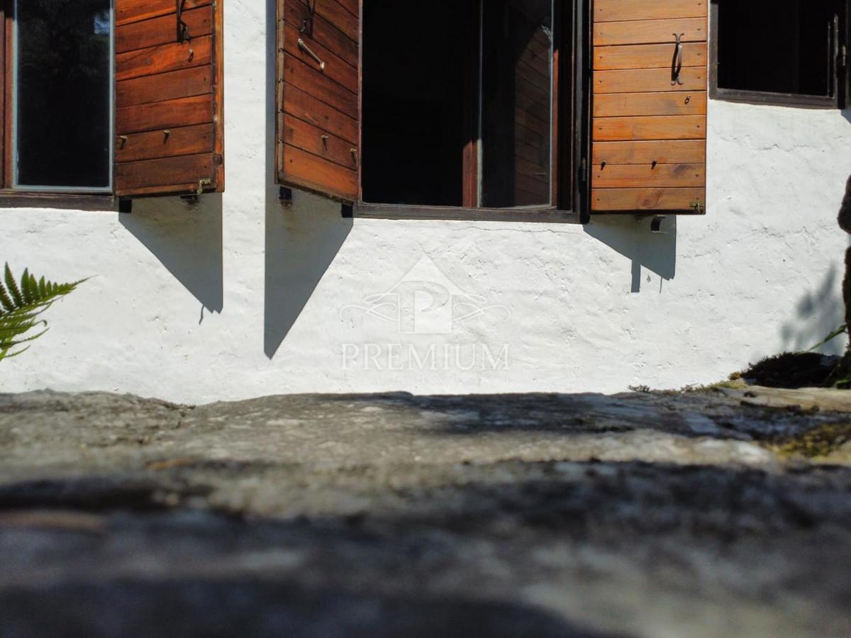 CASA UNIFAMILIARE CON AMPIO GIARDINO IN POSIZIONE TRANQUILLA