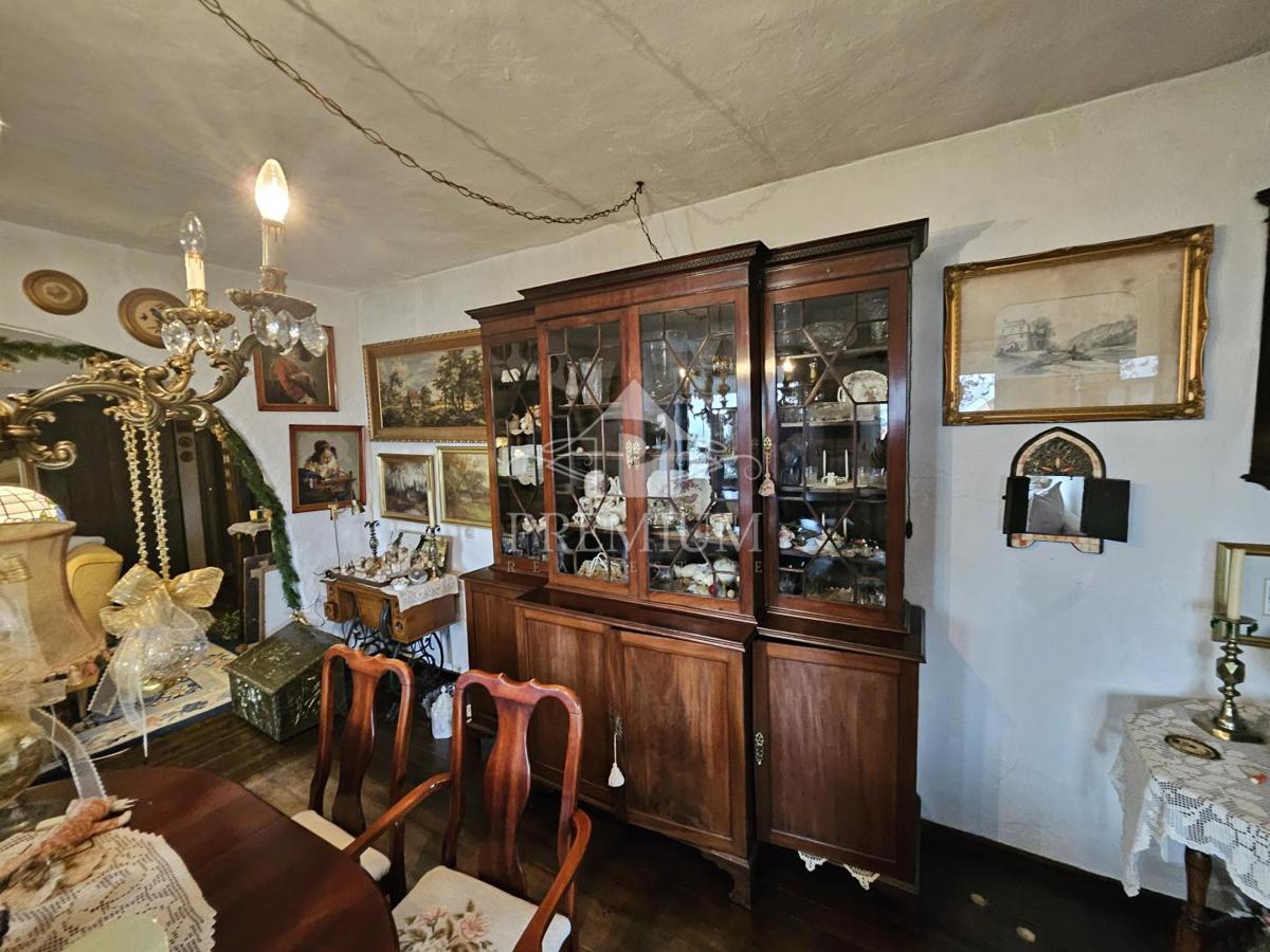 CASA UNIFAMILIARE CON AMPIO GIARDINO IN POSIZIONE TRANQUILLA