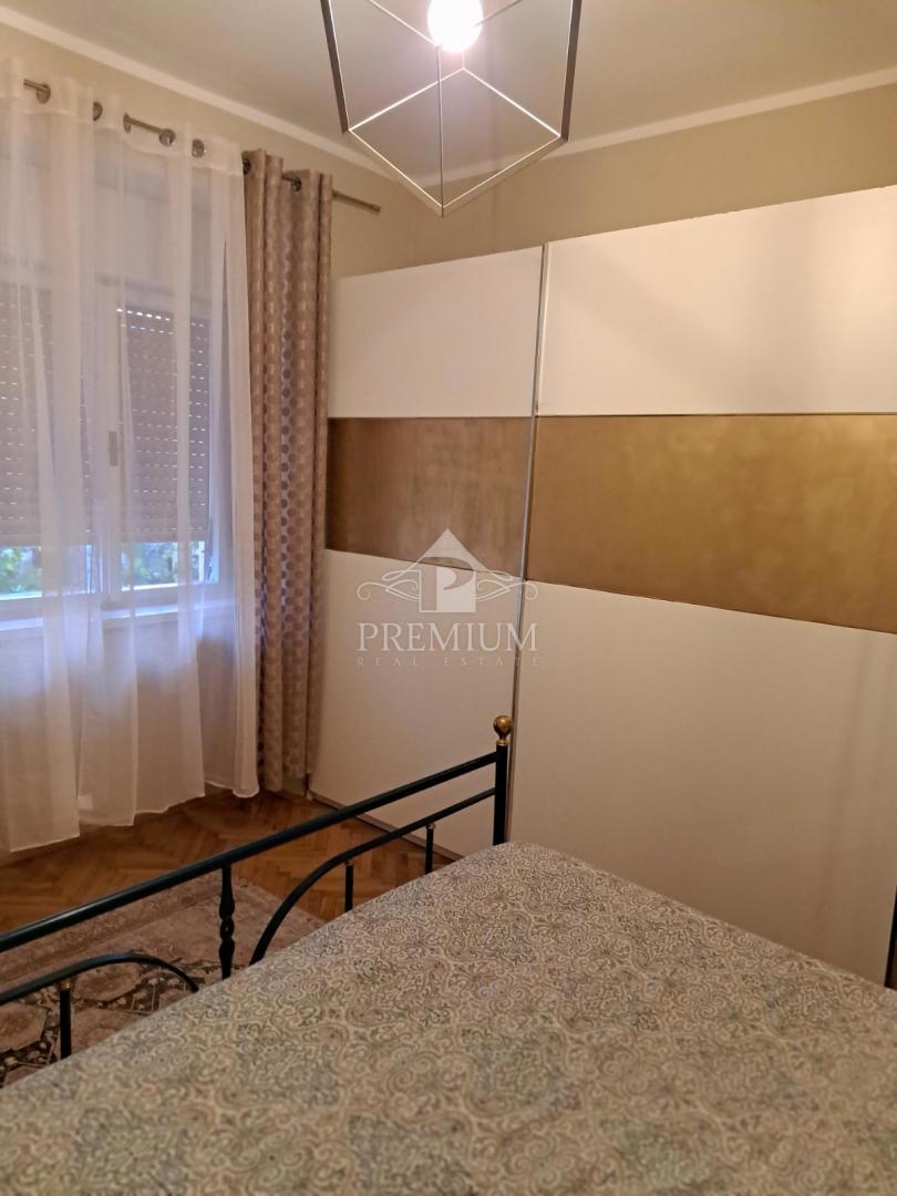 APPARTAMENTO CON DUE CAMERE DA LETTO, GIARDINO E PARCHEGGIO