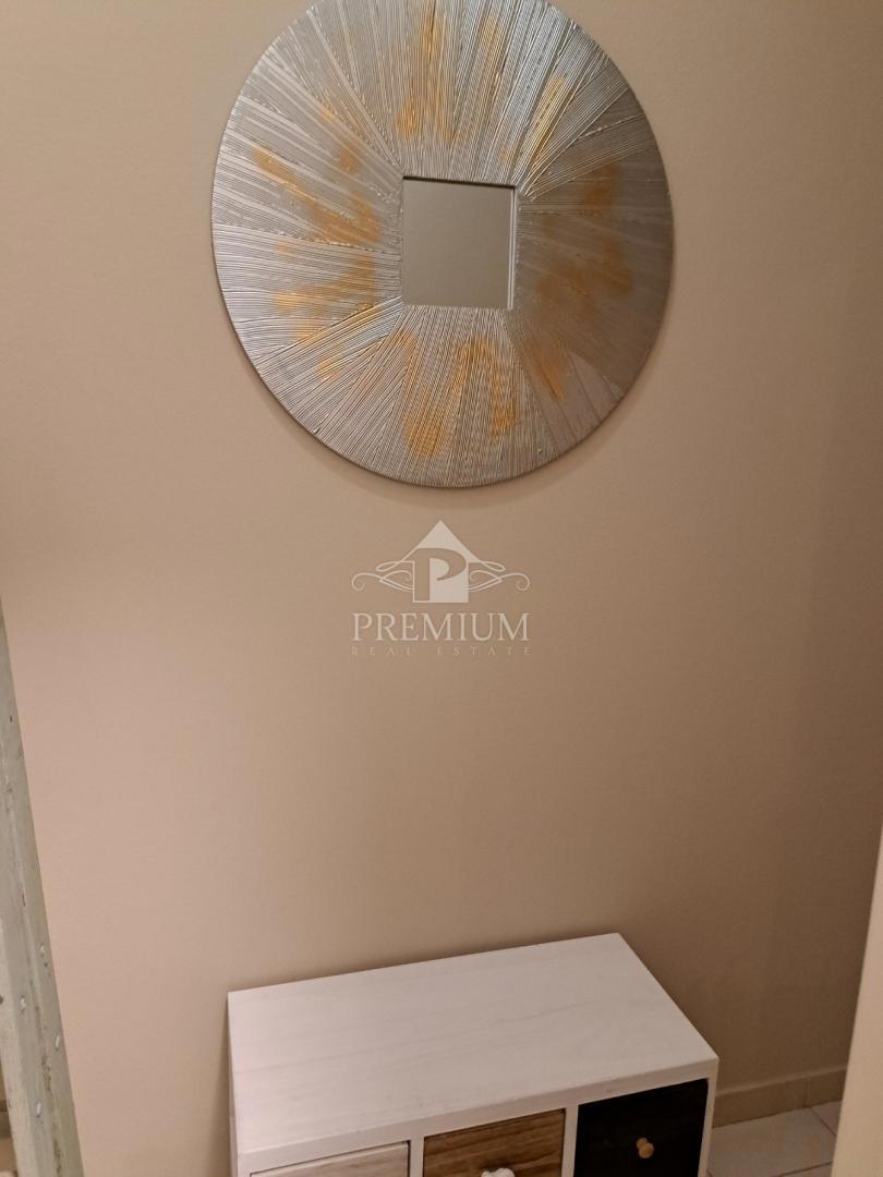 APPARTAMENTO CON DUE CAMERE DA LETTO, GIARDINO E PARCHEGGIO