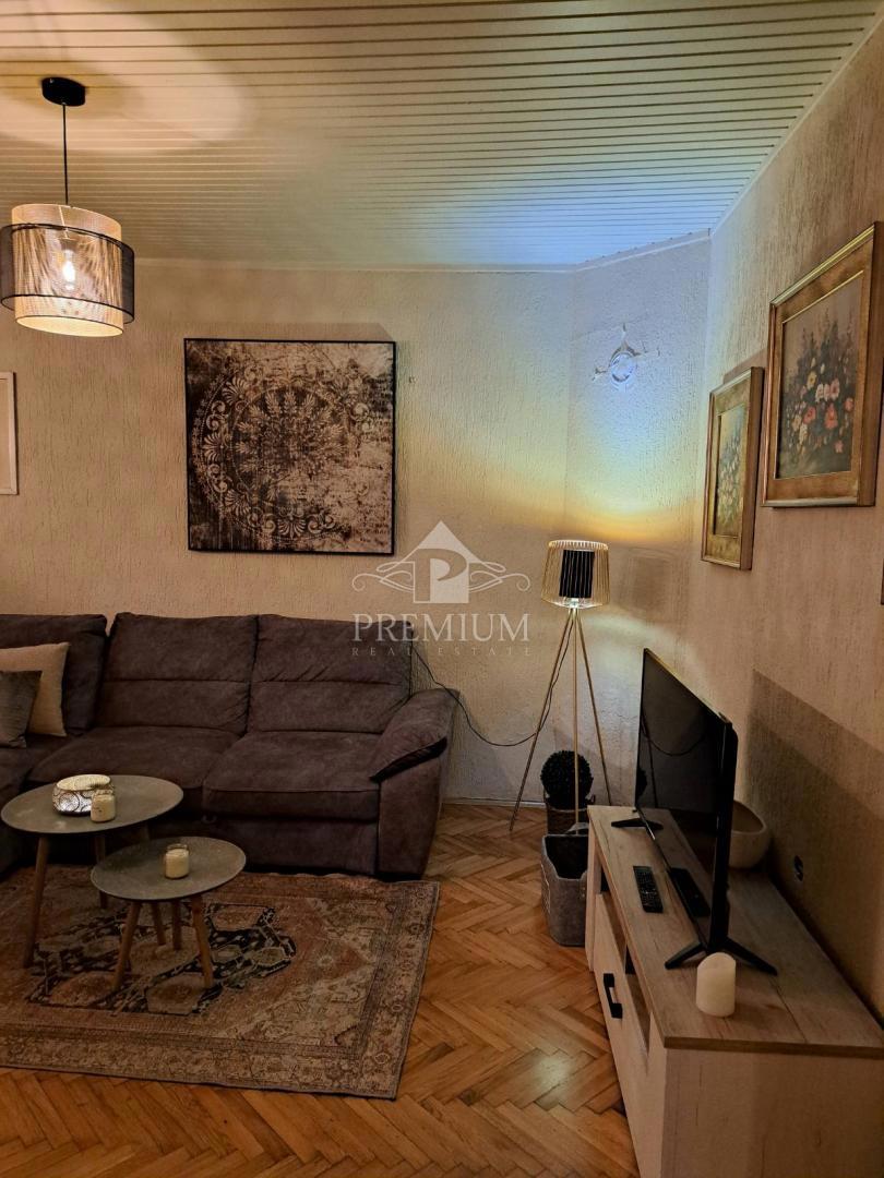 APPARTAMENTO CON DUE CAMERE DA LETTO, GIARDINO E PARCHEGGIO