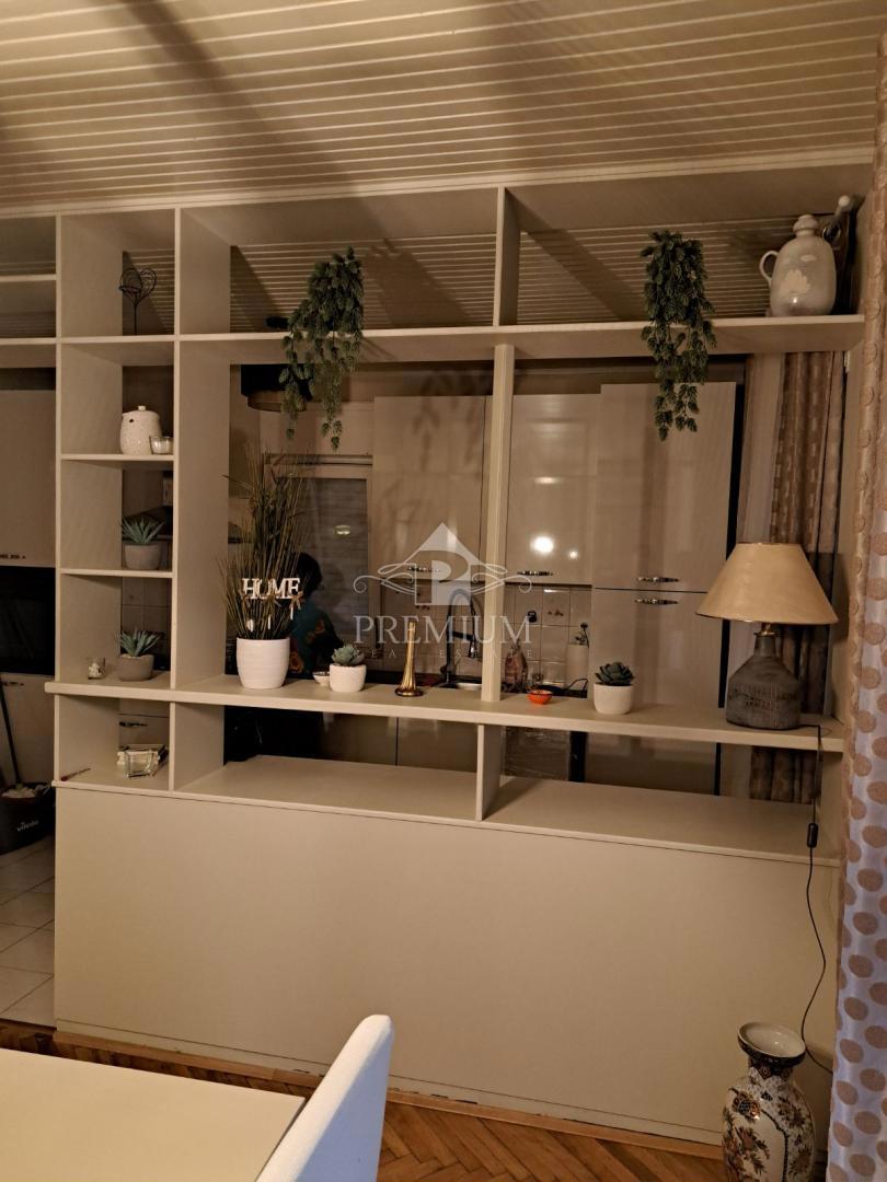 APPARTAMENTO CON DUE CAMERE DA LETTO, GIARDINO E PARCHEGGIO