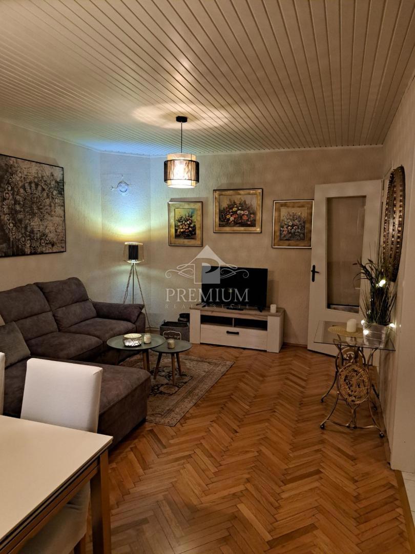 APPARTAMENTO CON DUE CAMERE DA LETTO, GIARDINO E PARCHEGGIO