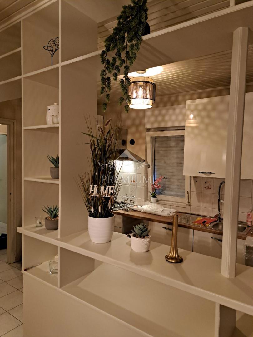 APPARTAMENTO CON DUE CAMERE DA LETTO, GIARDINO E PARCHEGGIO