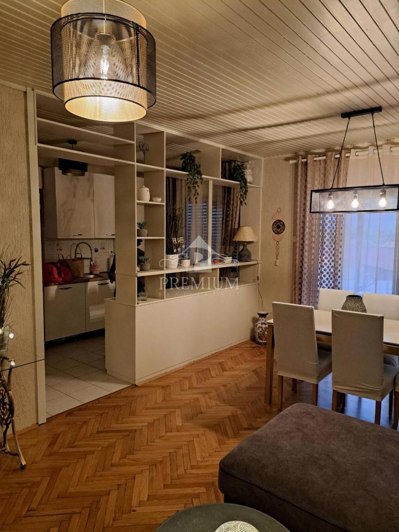 APPARTAMENTO CON DUE CAMERE DA LETTO, GIARDINO E PARCHEGGIO