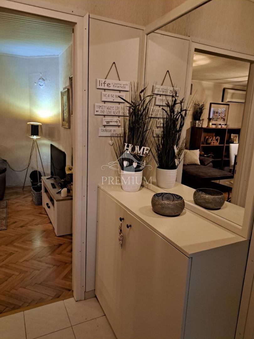 APPARTAMENTO CON DUE CAMERE DA LETTO, GIARDINO E PARCHEGGIO