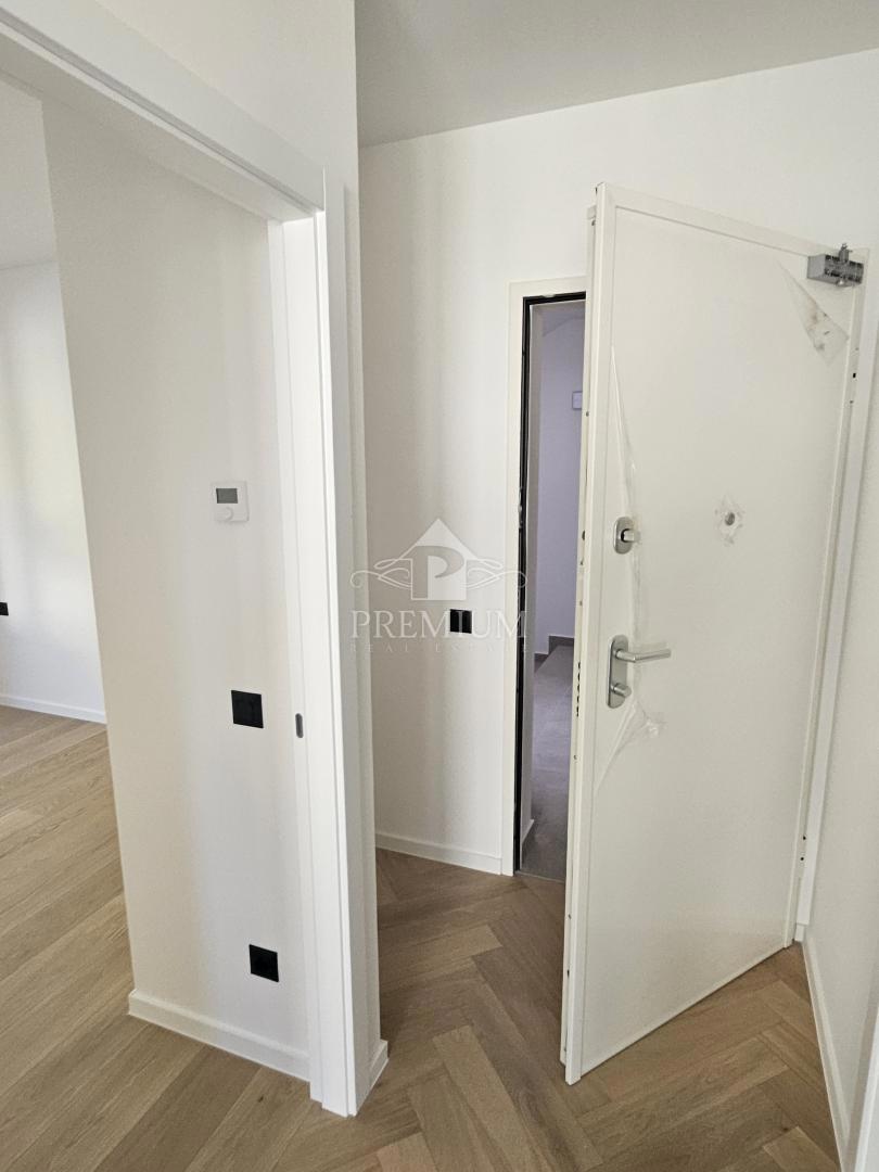 APPARTAMENTO IN NUOVA COSTRUZIONE, ASCENSORE, POSTO AUTO, GIARDINO