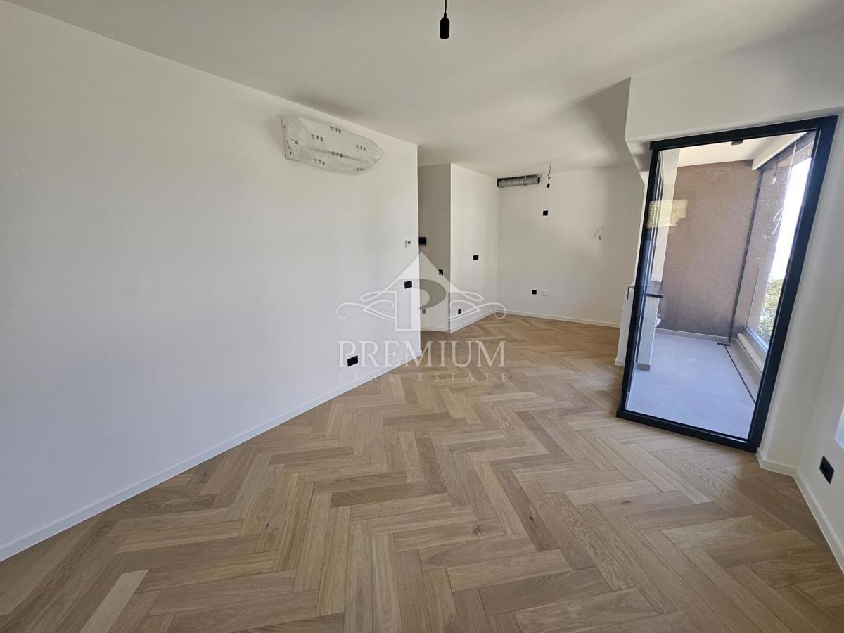 APPARTAMENTO IN NUOVA COSTRUZIONE, ASCENSORE, POSTO AUTO, GIARDINO