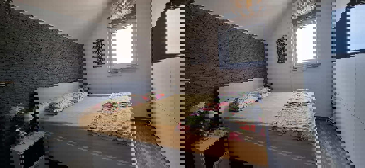 FUNTANA - MODERNO APPARTAMENTO CON GIARDINO IN VENDITA VICINO AL MARE