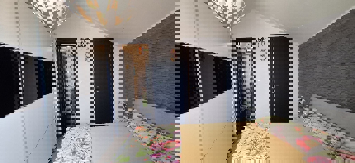 FUNTANA - MODERNO APPARTAMENTO CON GIARDINO IN VENDITA VICINO AL MARE