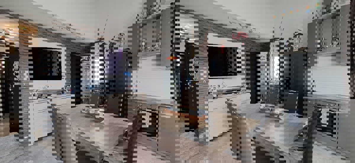 FUNTANA - MODERNO APPARTAMENTO CON GIARDINO IN VENDITA VICINO AL MARE