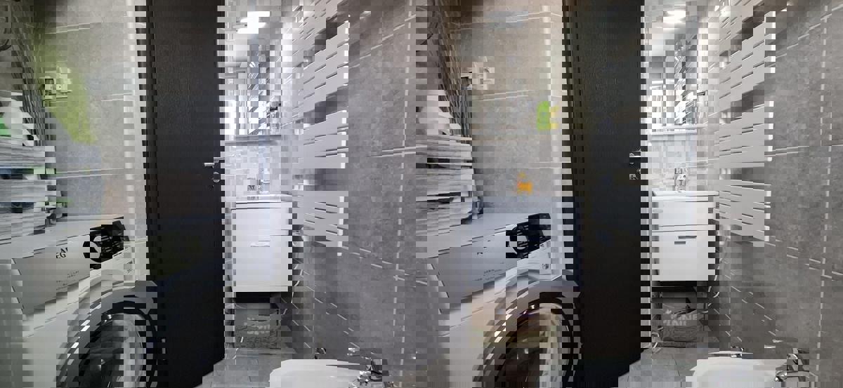 FUNTANA - MODERNO APPARTAMENTO CON GIARDINO IN VENDITA VICINO AL MARE