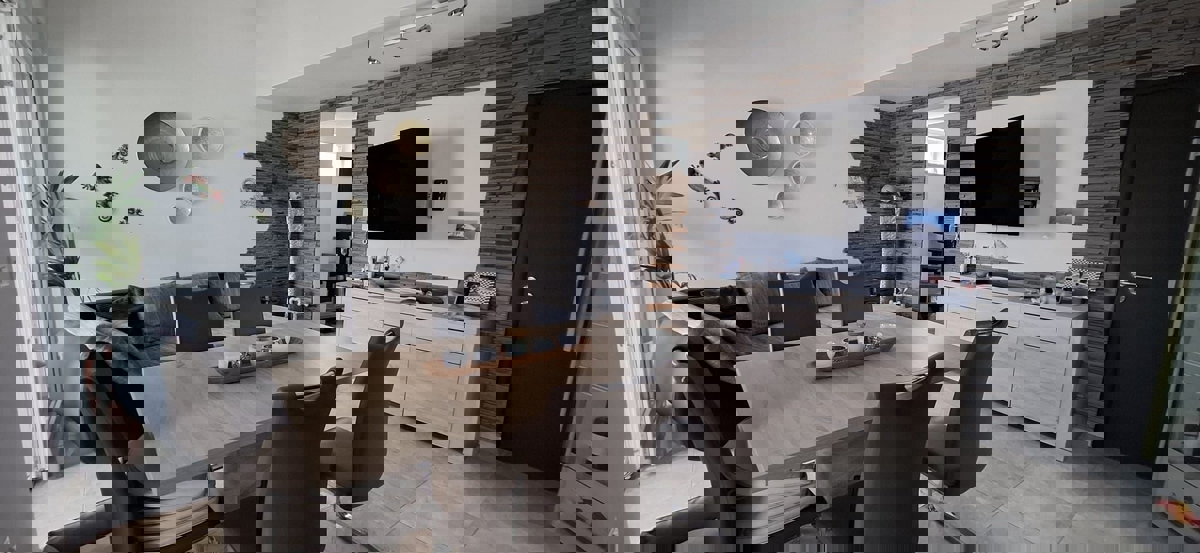 FUNTANA - MODERNO APPARTAMENTO CON GIARDINO IN VENDITA VICINO AL MARE