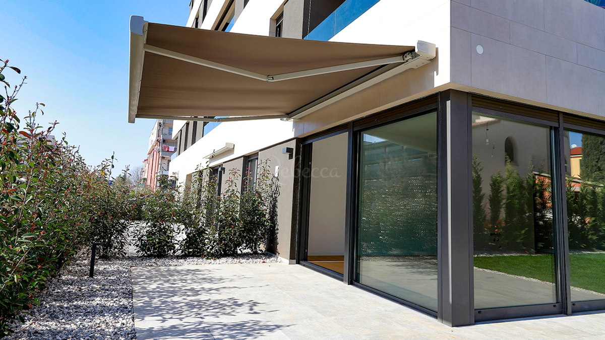 Appartamento con giardino al piano terra