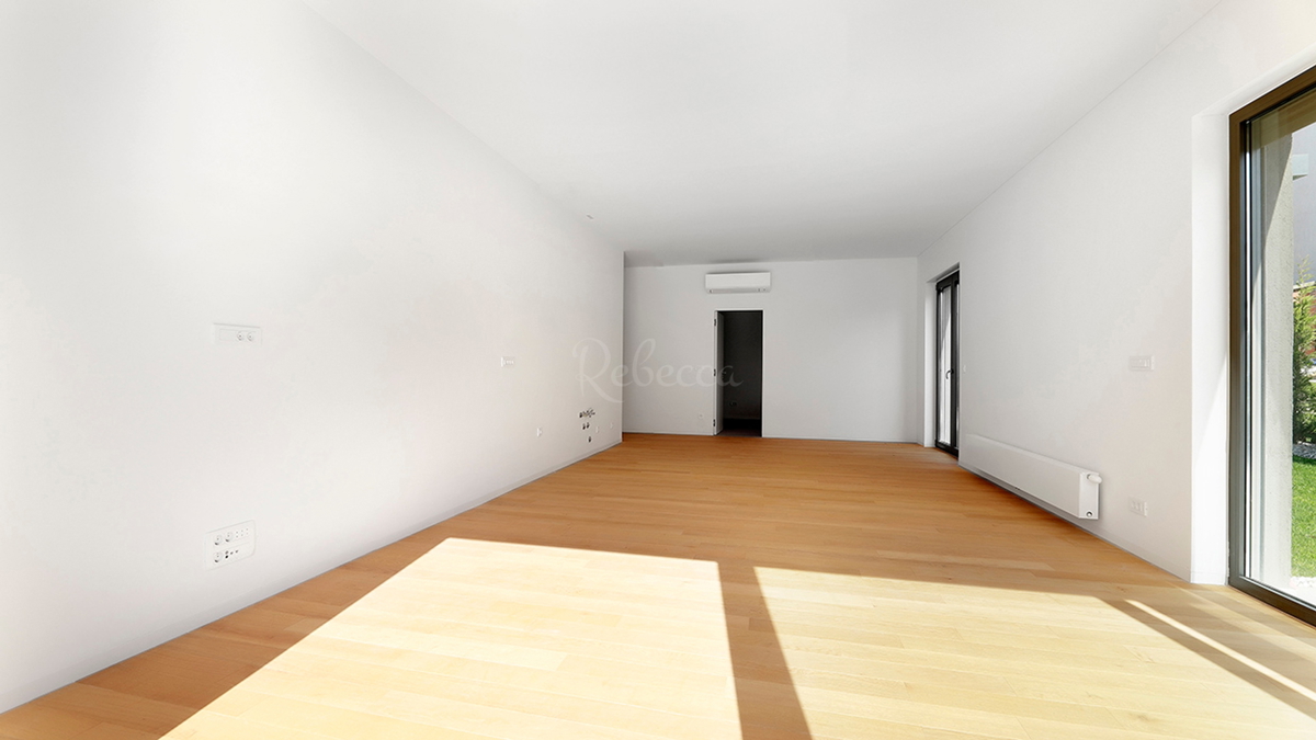 Appartamento con giardino al piano terra