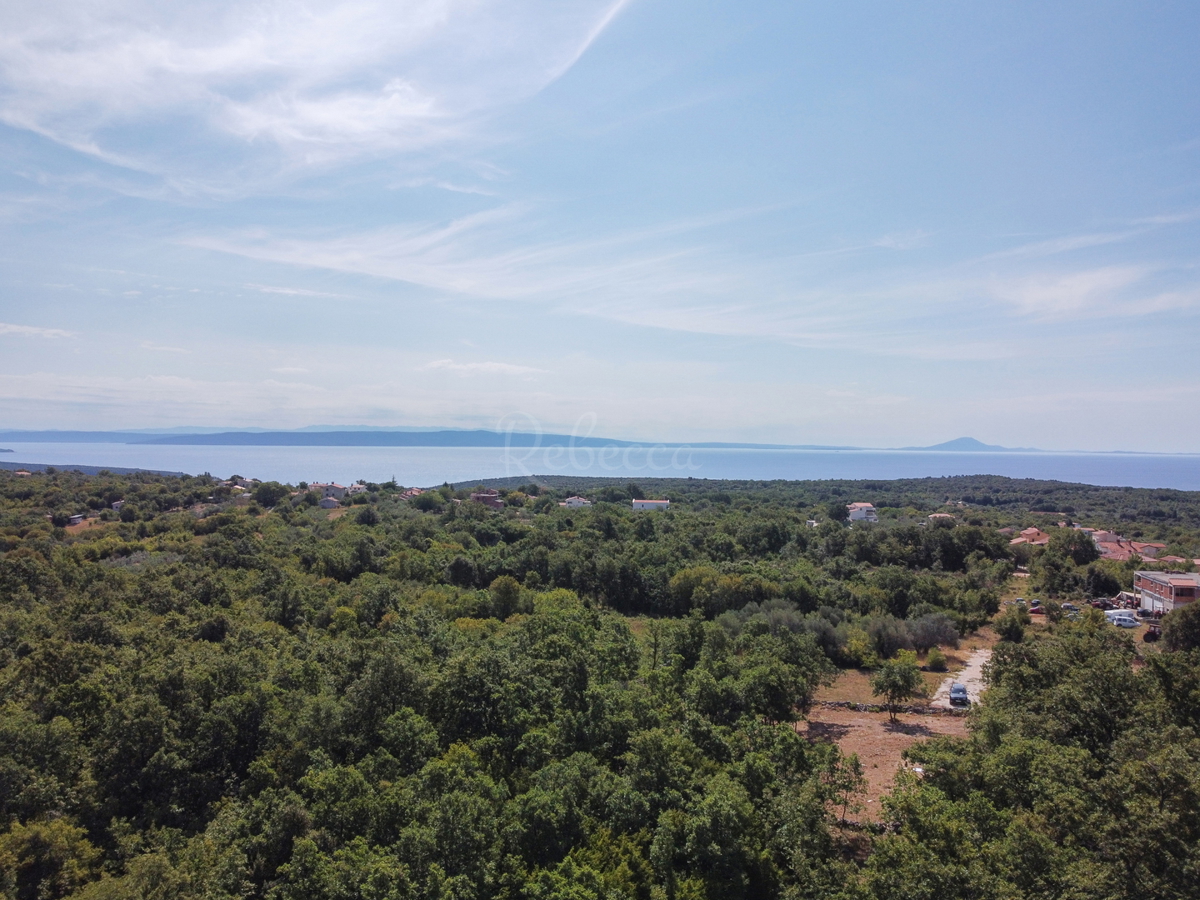 Peruški, terreno edificabile con permesso di costruzione per tre case di fila, vista mare