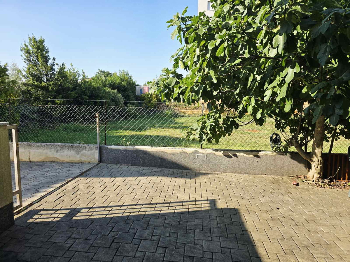 Appartamento di 60 m² con giardino di 50 m² e 2 posti auto: pronto per essere abitato subito!