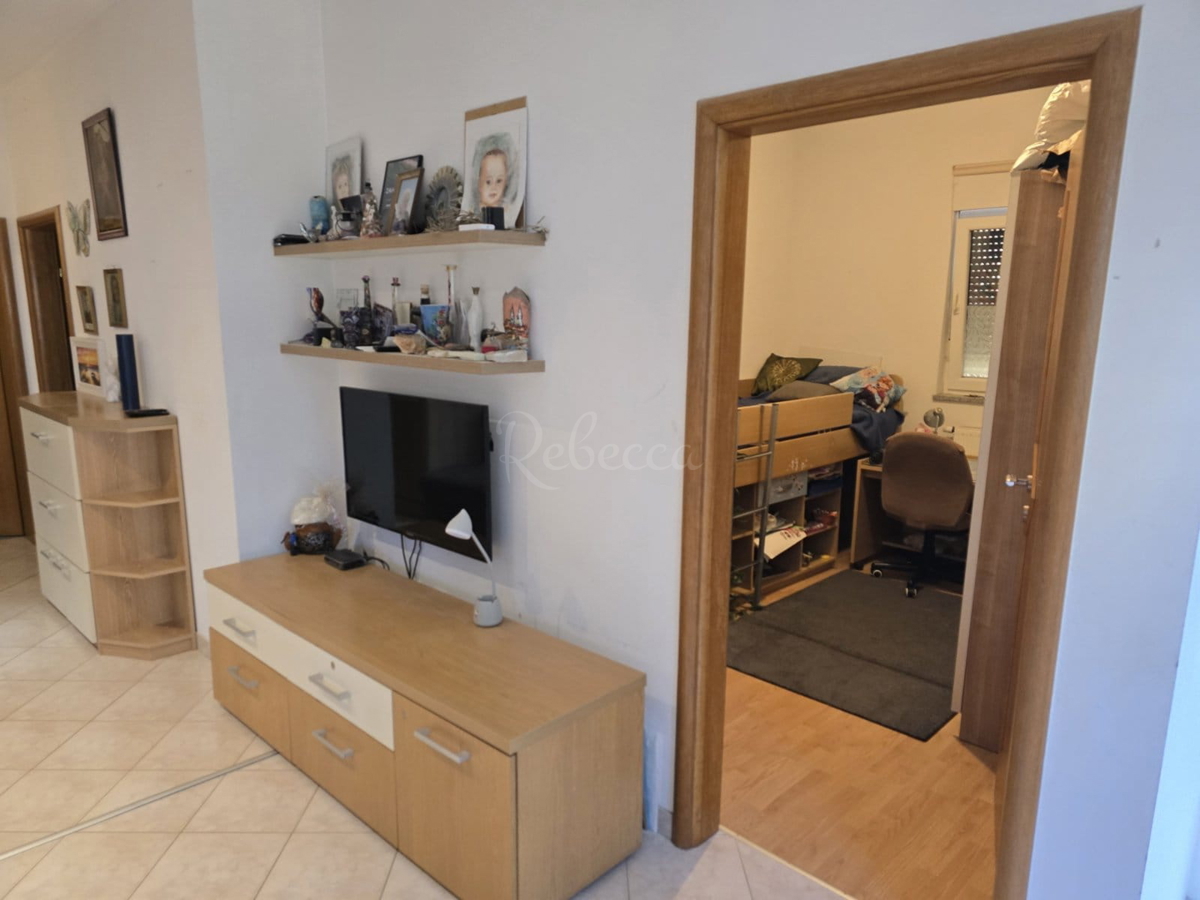 Appartamento di 60 m² con giardino di 50 m² e 2 posti auto: pronto per essere abitato subito!