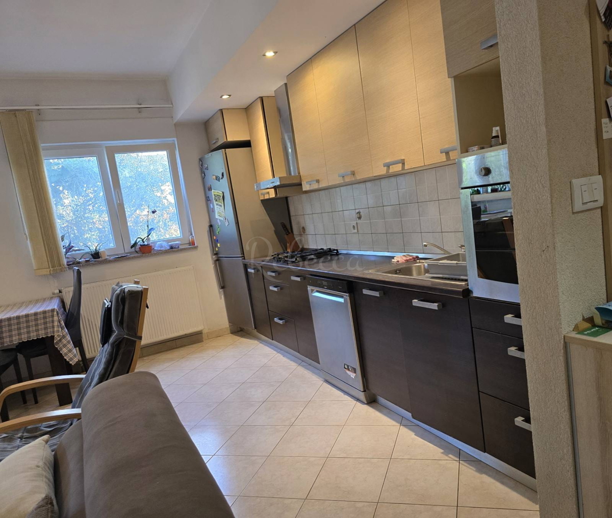 Appartamento di 60 m² con giardino di 50 m² e 2 posti auto: pronto per essere abitato subito!