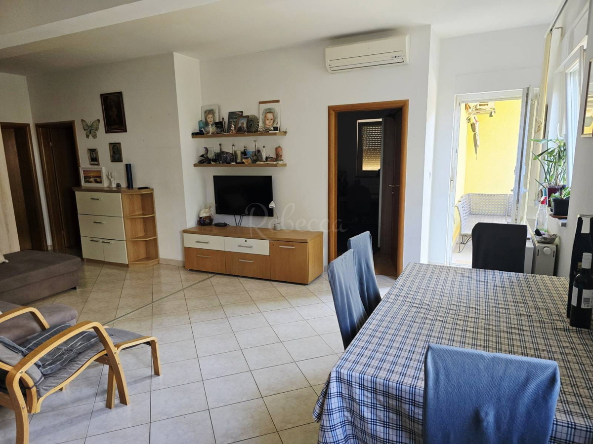 Appartamento di 60 m² con giardino di 50 m² e 2 posti auto: pronto per essere abitato subito!