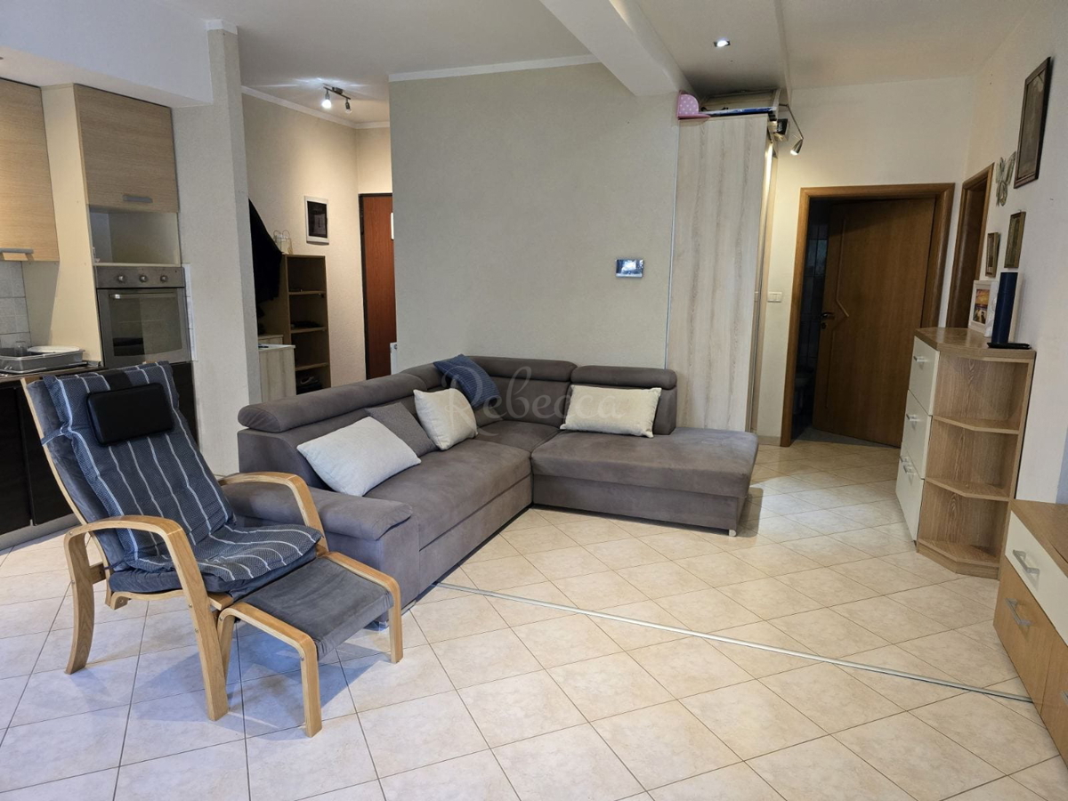 Appartamento di 60 m² con giardino di 50 m² e 2 posti auto: pronto per essere abitato subito!