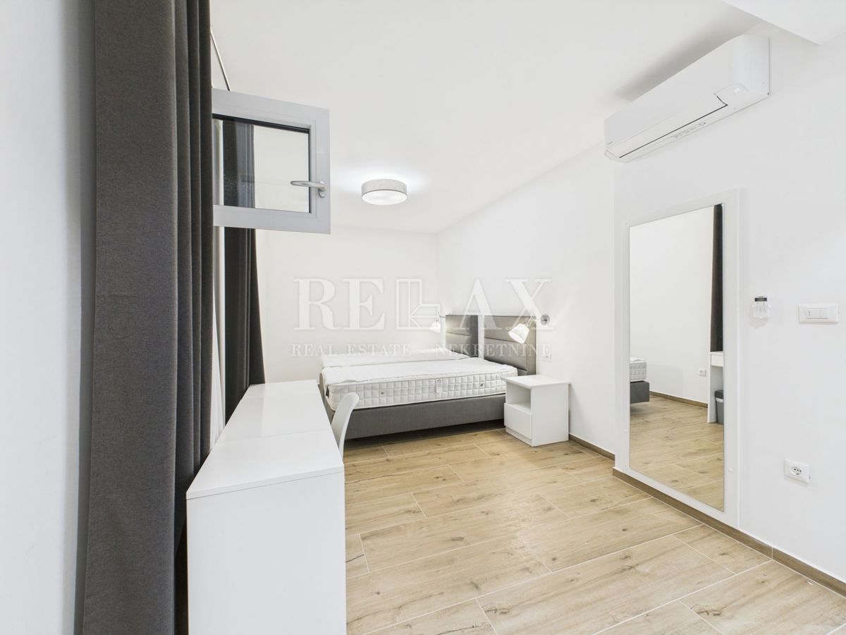 Njivice - appartamento duplex con piscina e giardino