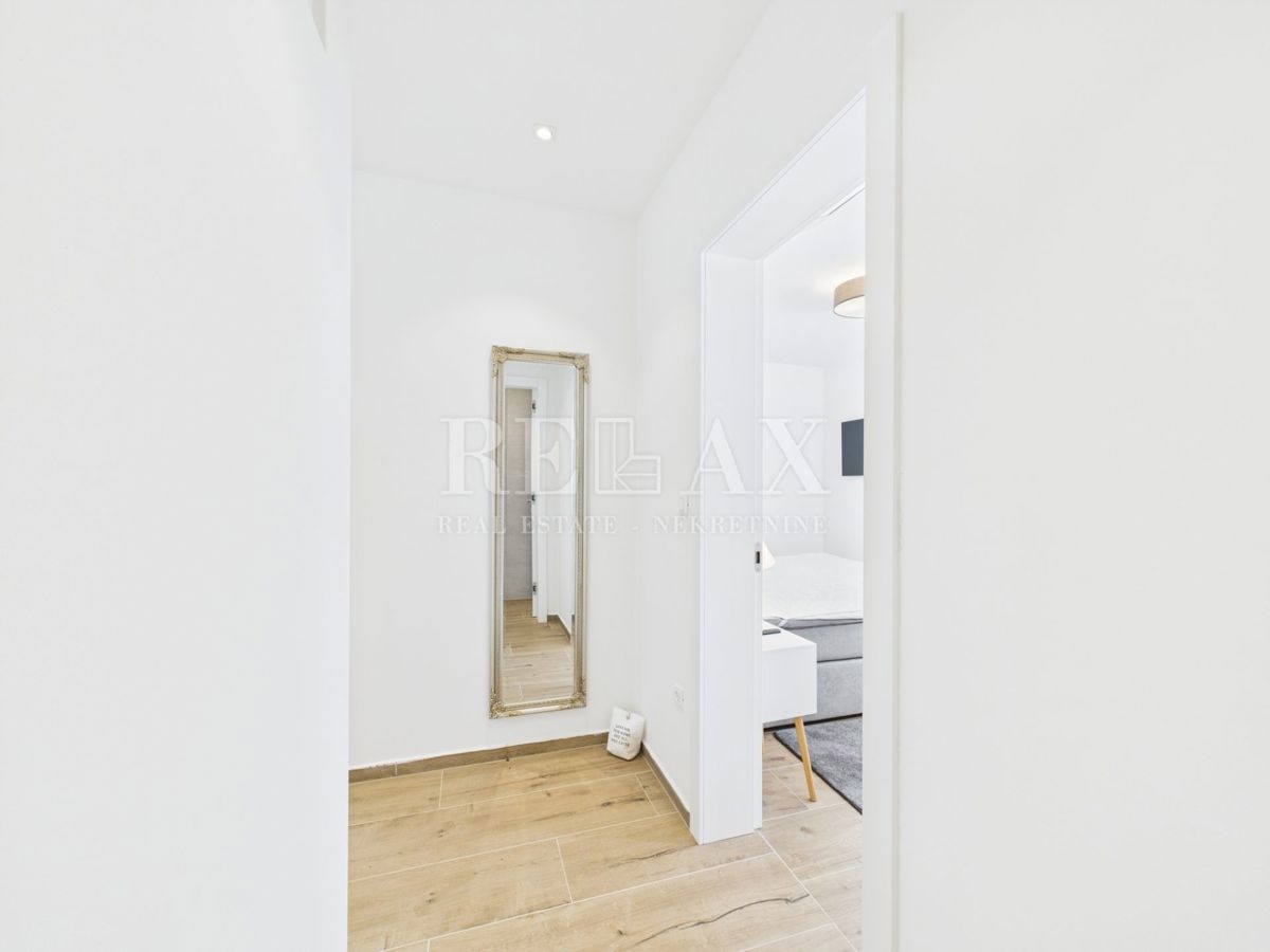 Njivice - appartamento duplex con piscina e giardino