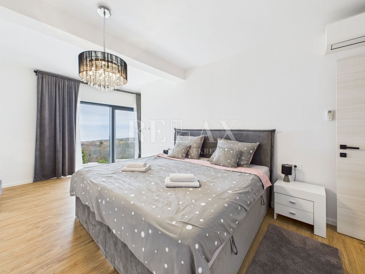 Šmrika - una bellissima villa con piscina e vista sul mare