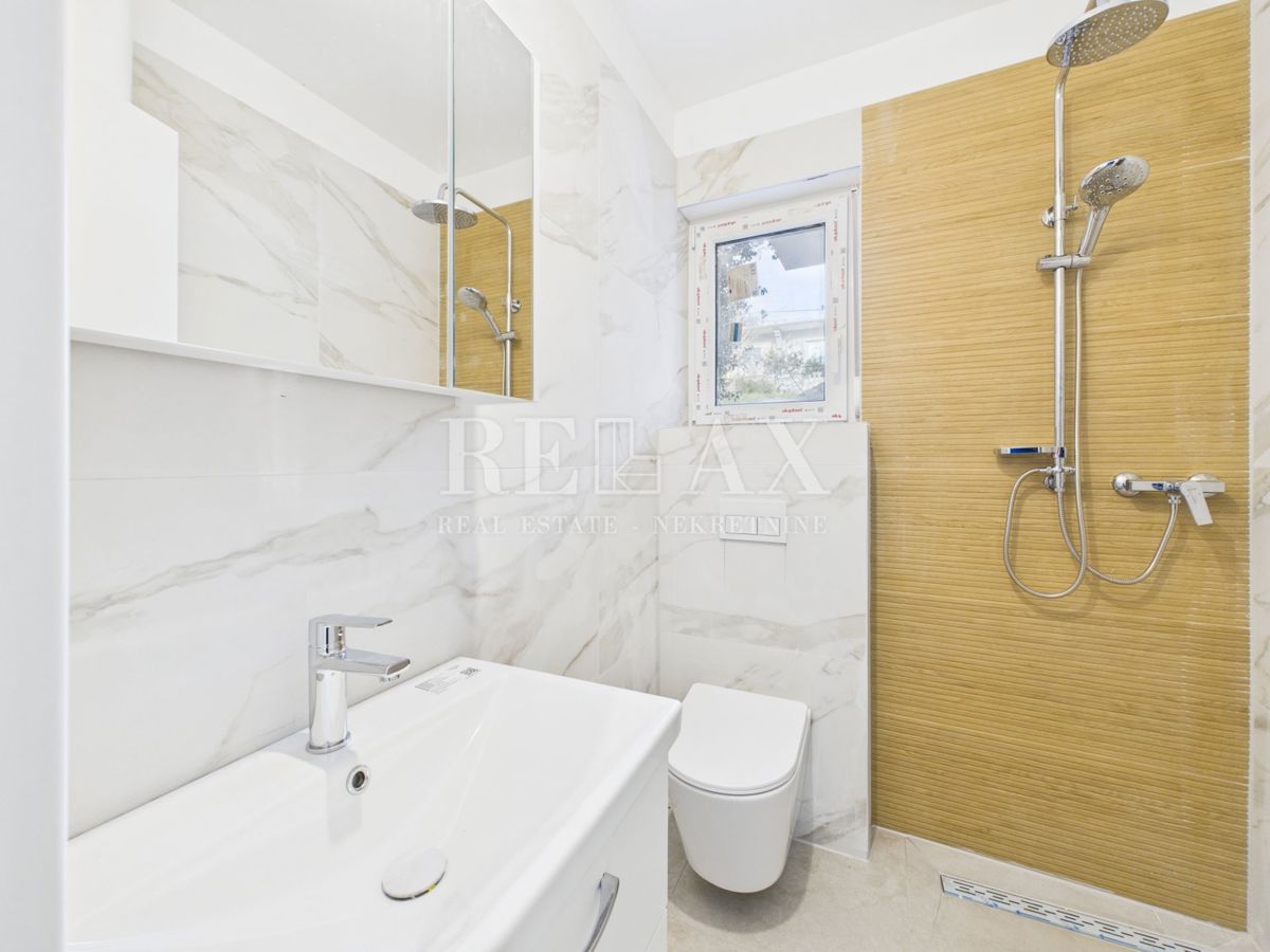 Povile - appartamento in edificio nuovo, parcheggio, giardino