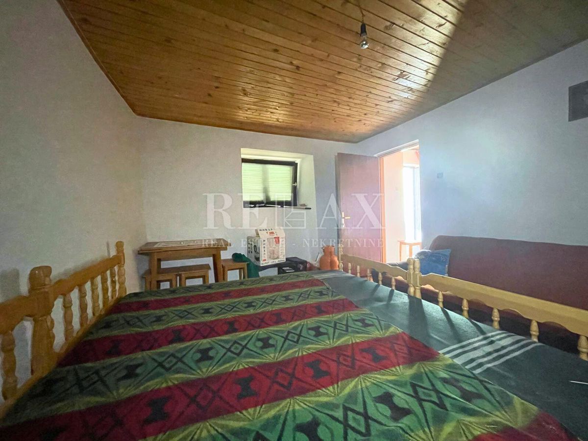 Crikvenica - casa in pietra in fila