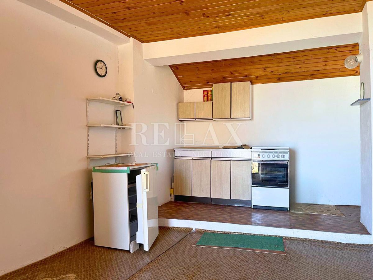 Crikvenica - casa in pietra in fila