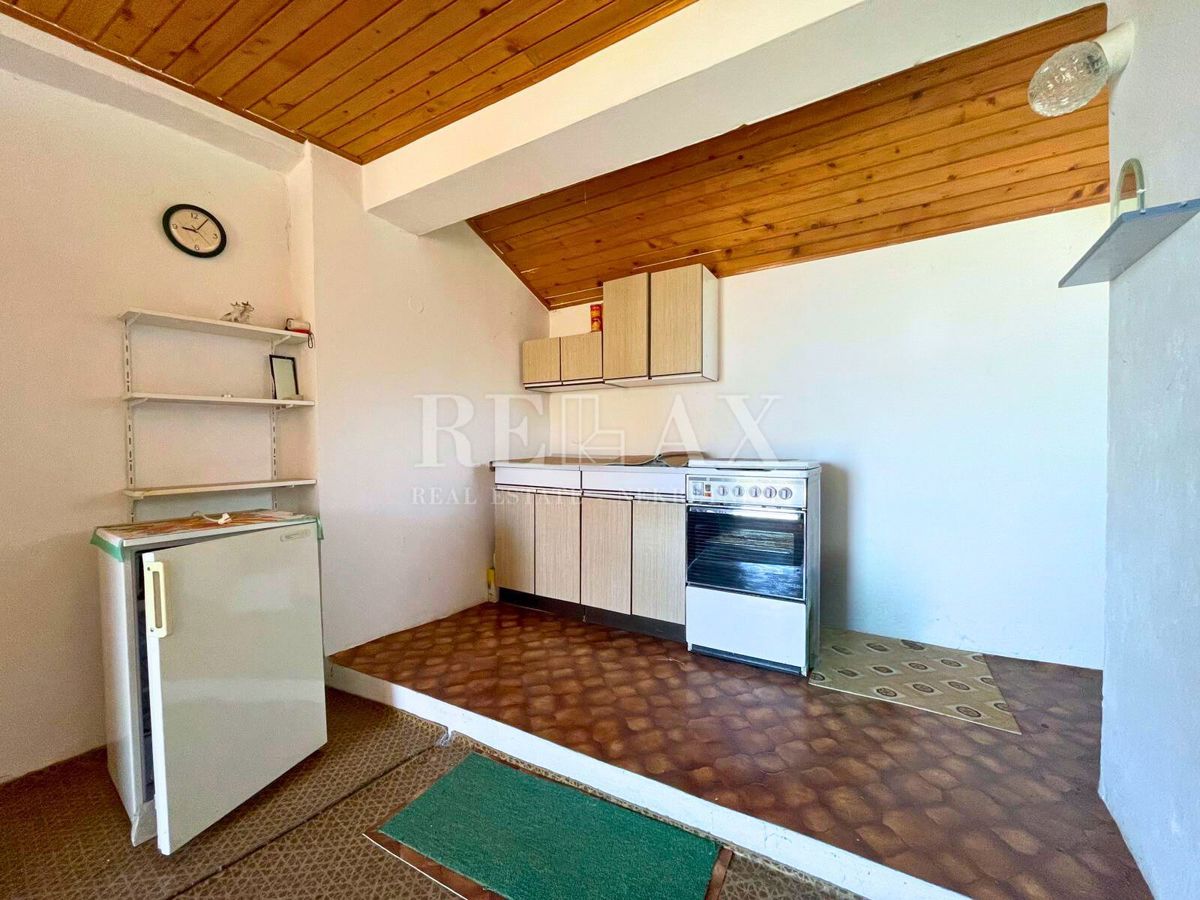 Crikvenica - casa in pietra in fila