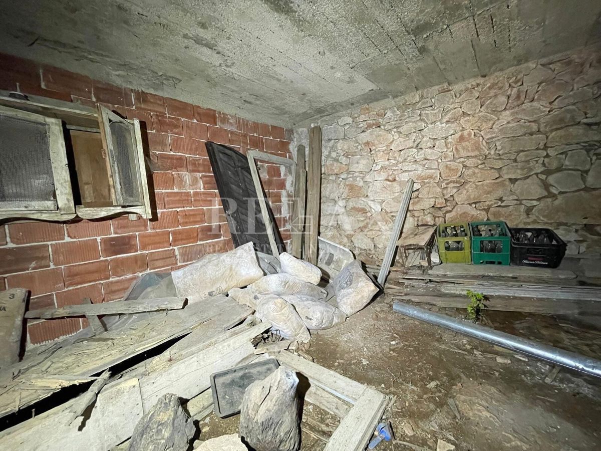 Crikvenica - casa in pietra in fila