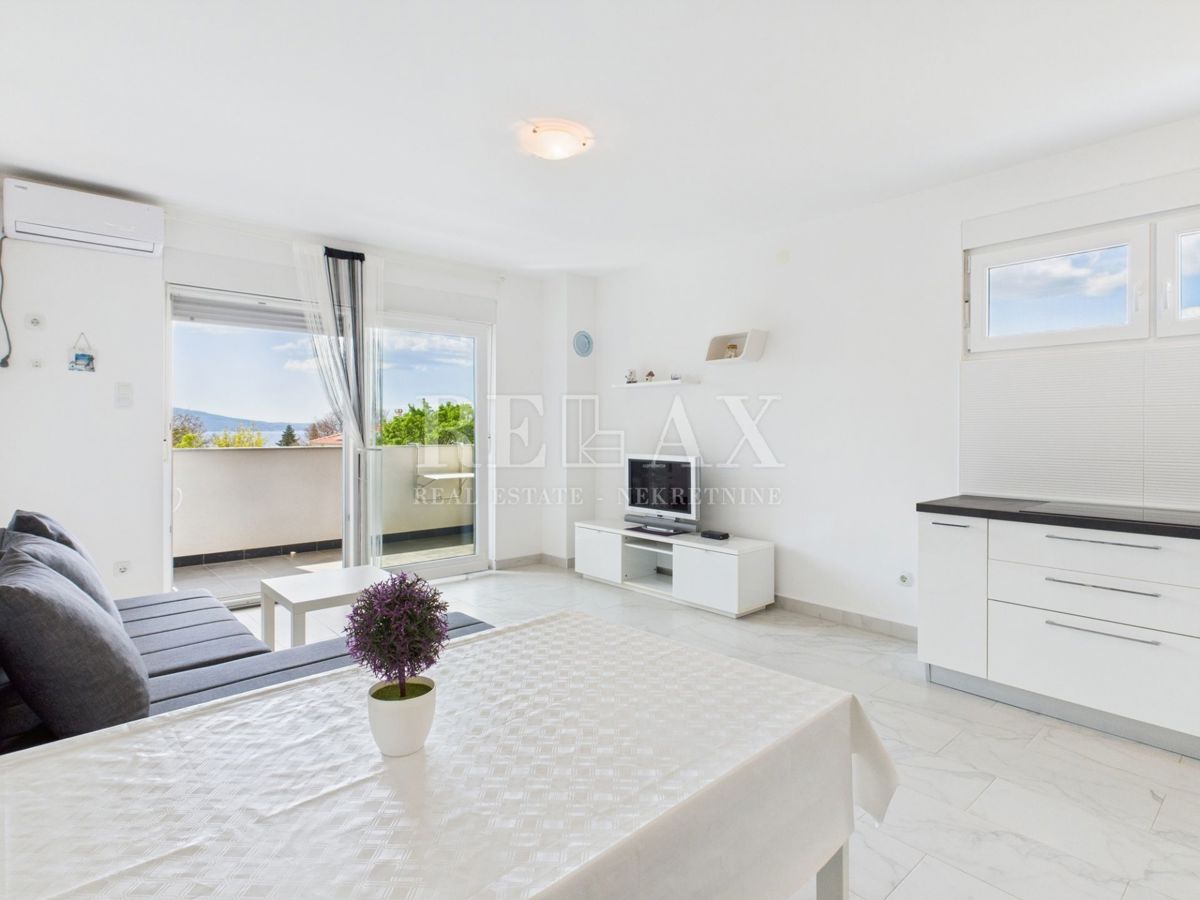 Povile - piano con due appartamenti