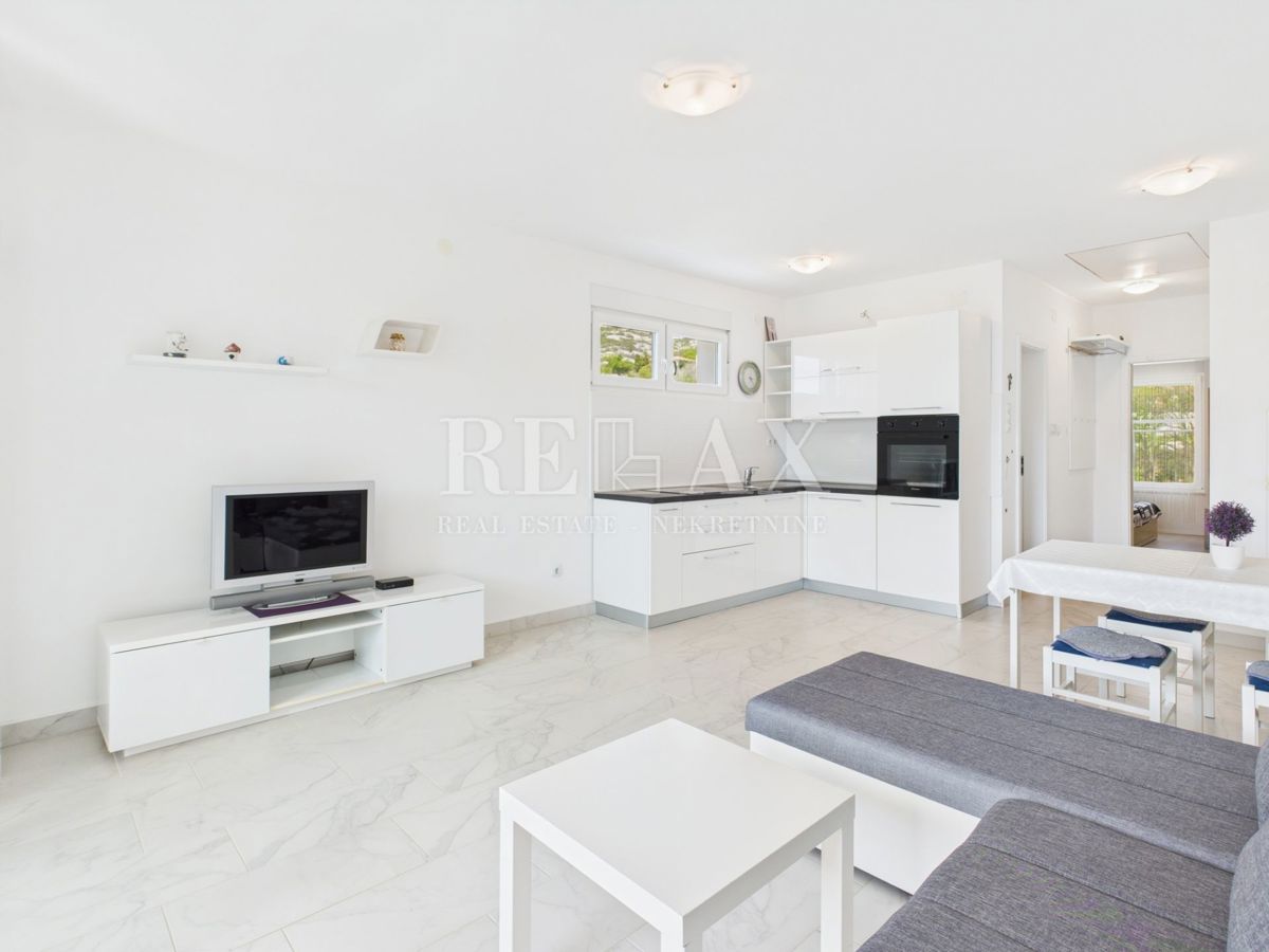 Povile - piano con due appartamenti