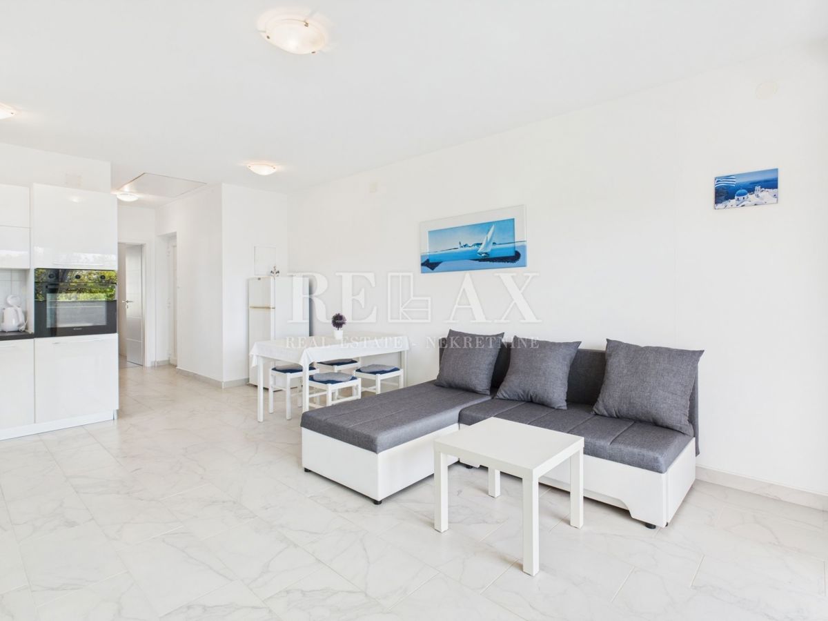 Povile - piano con due appartamenti