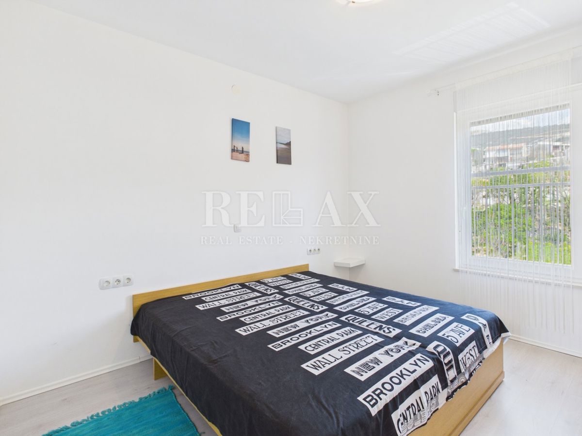 Povile - piano con due appartamenti