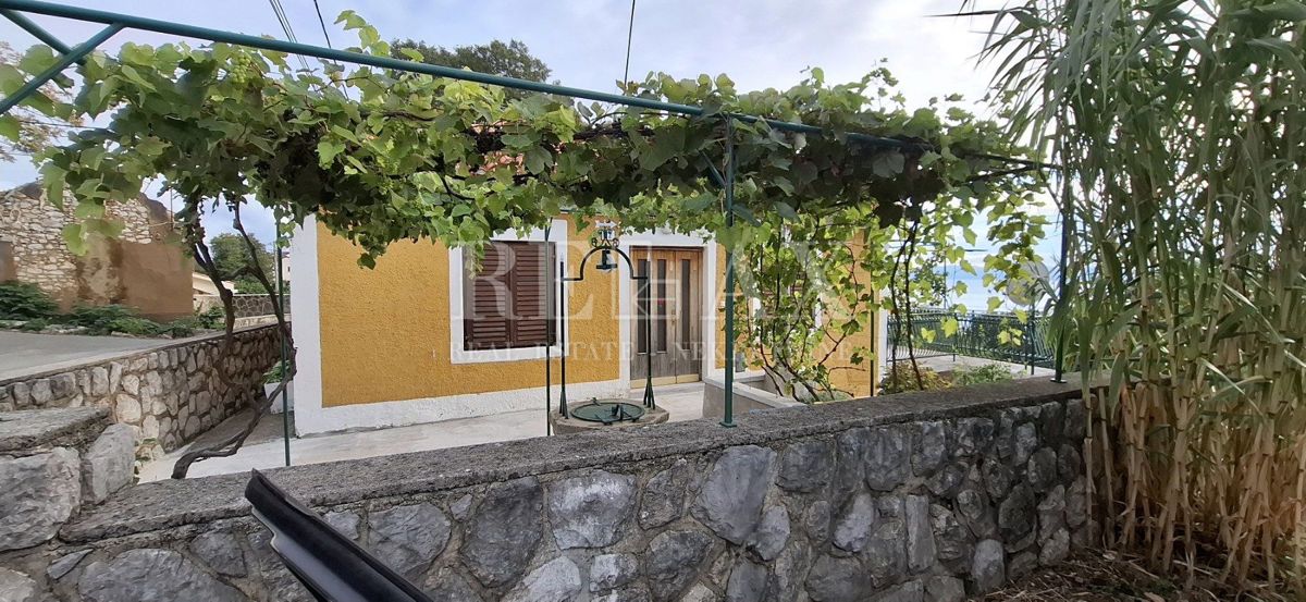 Casa in pietra con vista mare Kostrena