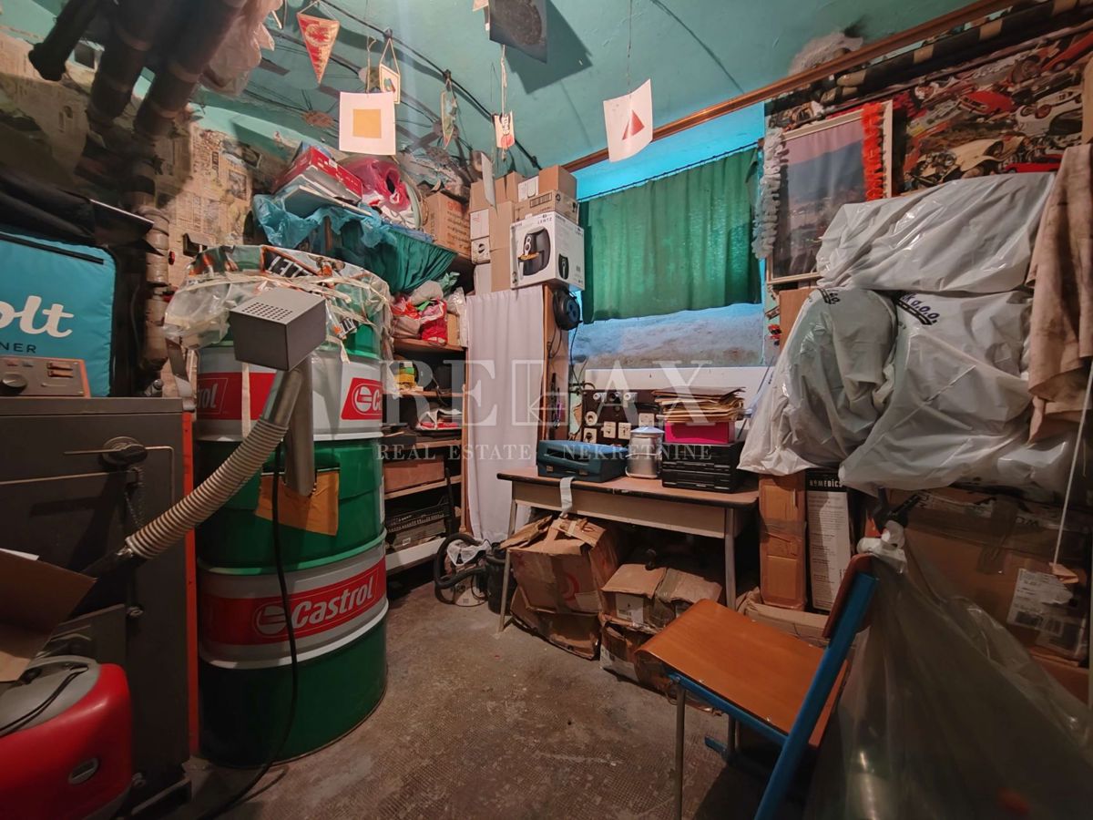 Abbazia - piano di una villa nel centro con garage 