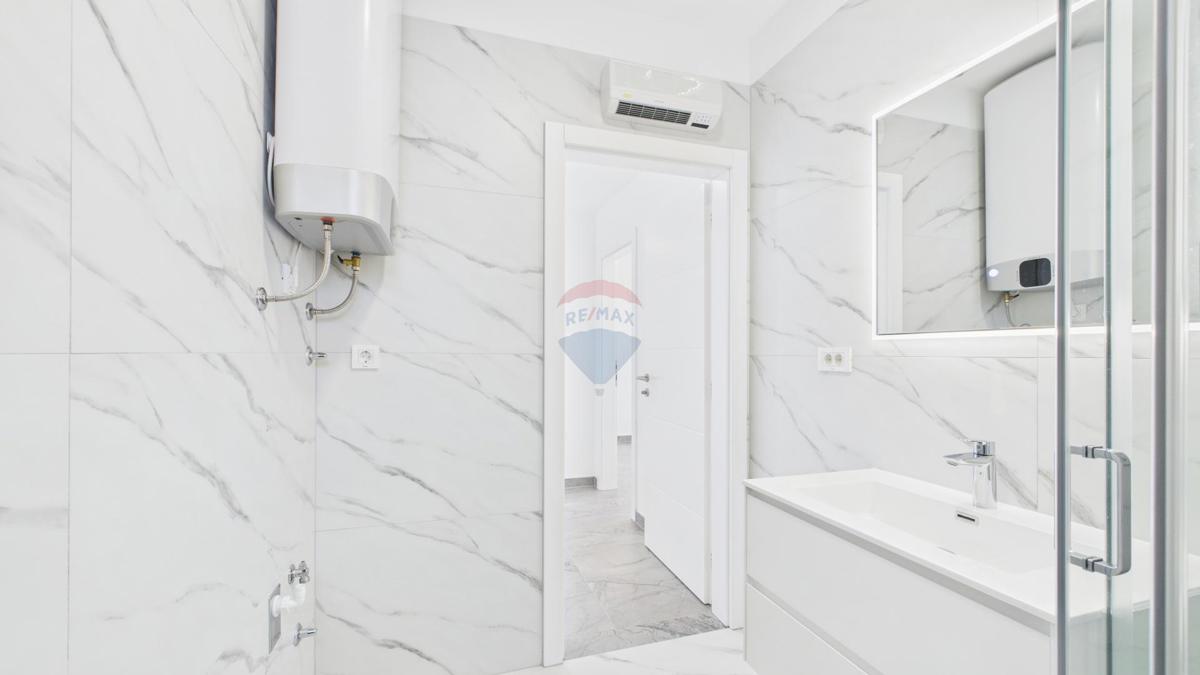 Crikvenica – nuova costruzione con vista, terrazza e parcheggio