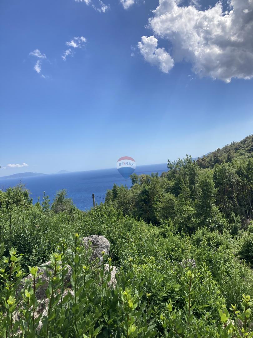 ISTRIA, PLOMIN - 2 Terreni edificabili con progetto e vista mare