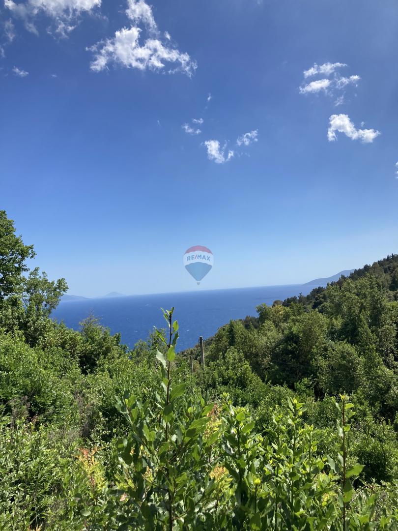 ISTRIA, PLOMIN - Terreno edificabile con progetto e vista mare