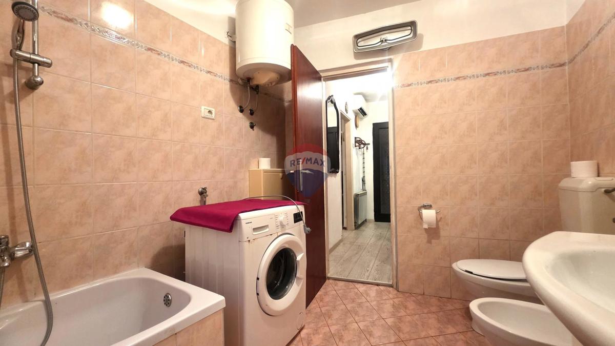 Casa in pietra istriana nel centro di Brtonigla – 3 livelli, balcone e mansarda